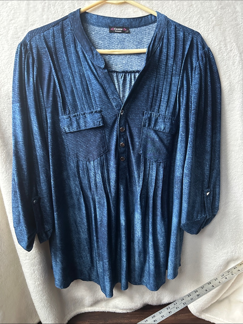 Cocomo brand women's blue washed pintuck tunic blouse.